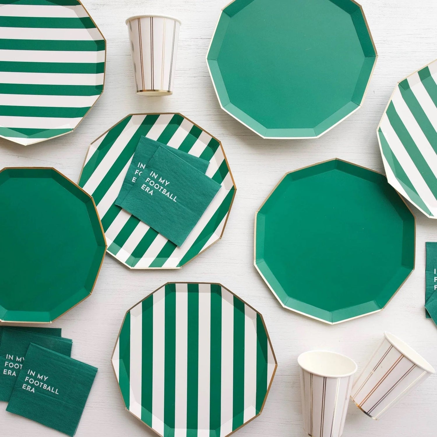 green striped plates and all green plates and cups 